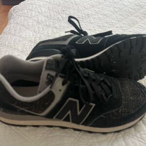 New balance 9.5 black with multi colored thread.